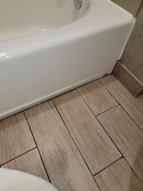 Missing grout between bathroom tiles