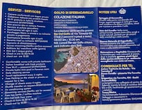 In room brochure of room amenities, local tours, and location for breakfast