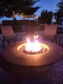 Propane fire pits are perfect for relaxing or snuggling next to on a chilly night.