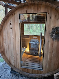 Cozy barrel sauna is nicely comfortable for 2