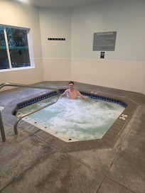 Hot tub well maintained and overlooking a beautiful courtyard.