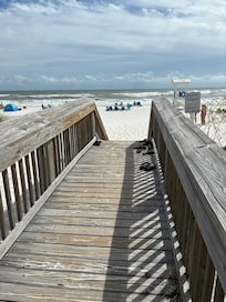 Walk to the beach and has a shower and bathroom at the entrance