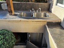 deteriorating outdoor kitchen area
