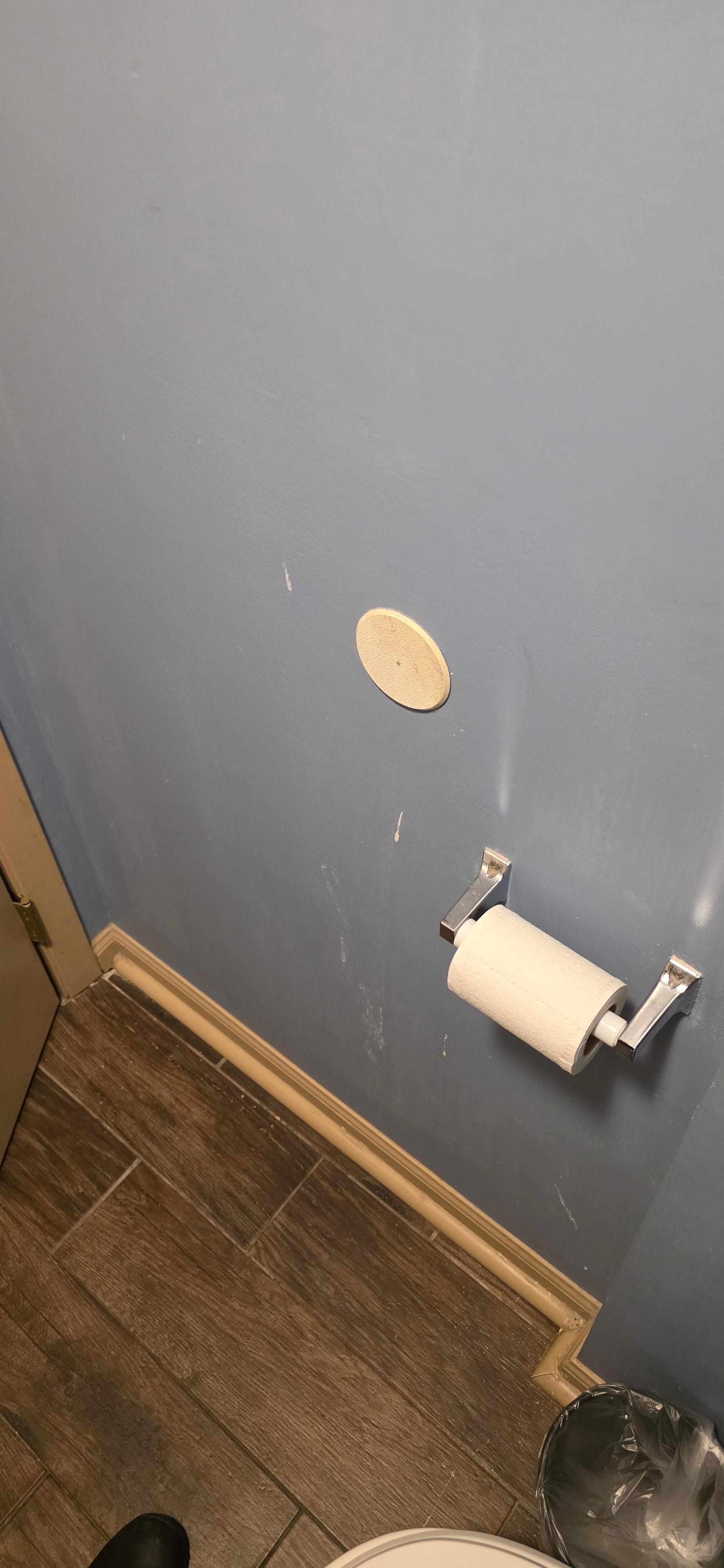 Stuff all over the bathroom wall