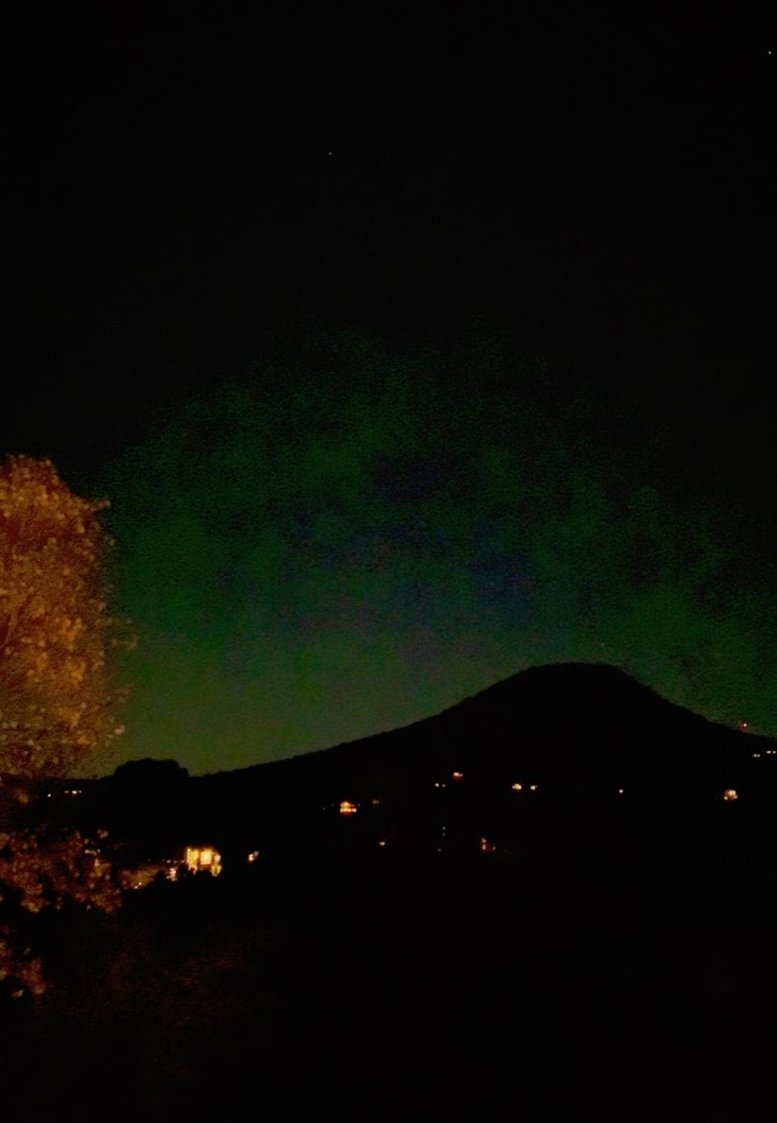 On December 1st, I KNOW I captured a weak Aurora Borealis. The index was high, and my later went off. This is at 3:30am from our room. Gorgeous ! 