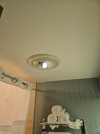 Missing Light fixture cover in bathroom
