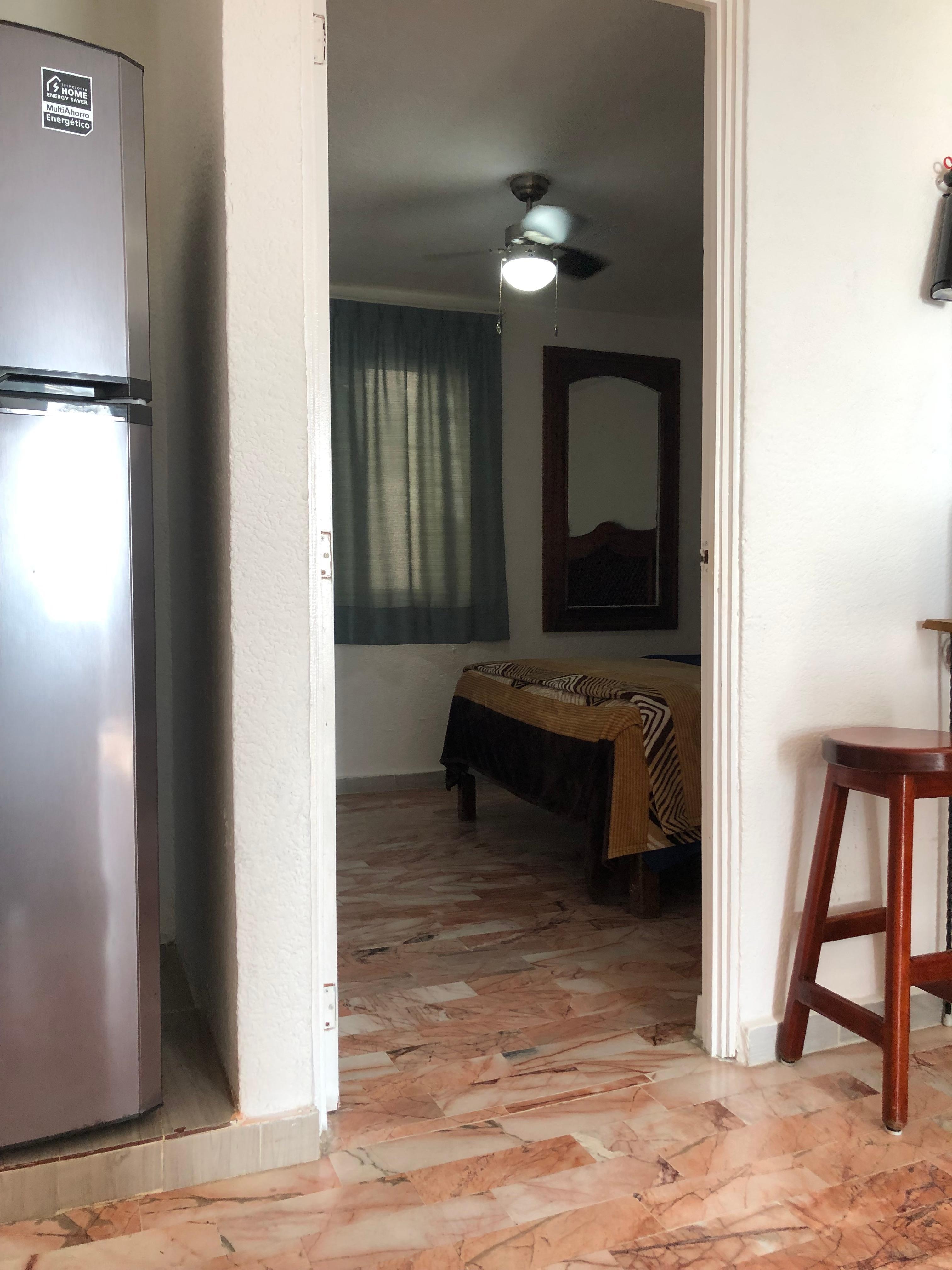 Upstairs Bedroom with 1 bed, must go downstairs for full bathroom 