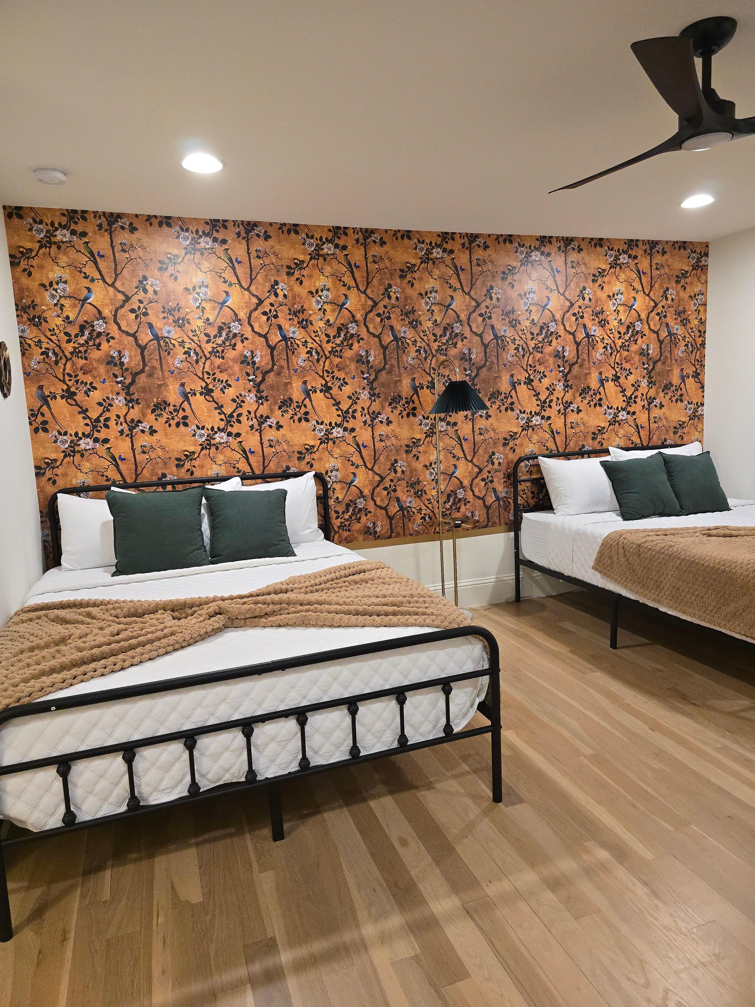 Lovely upstairs bedroom with full bath and by the game room.