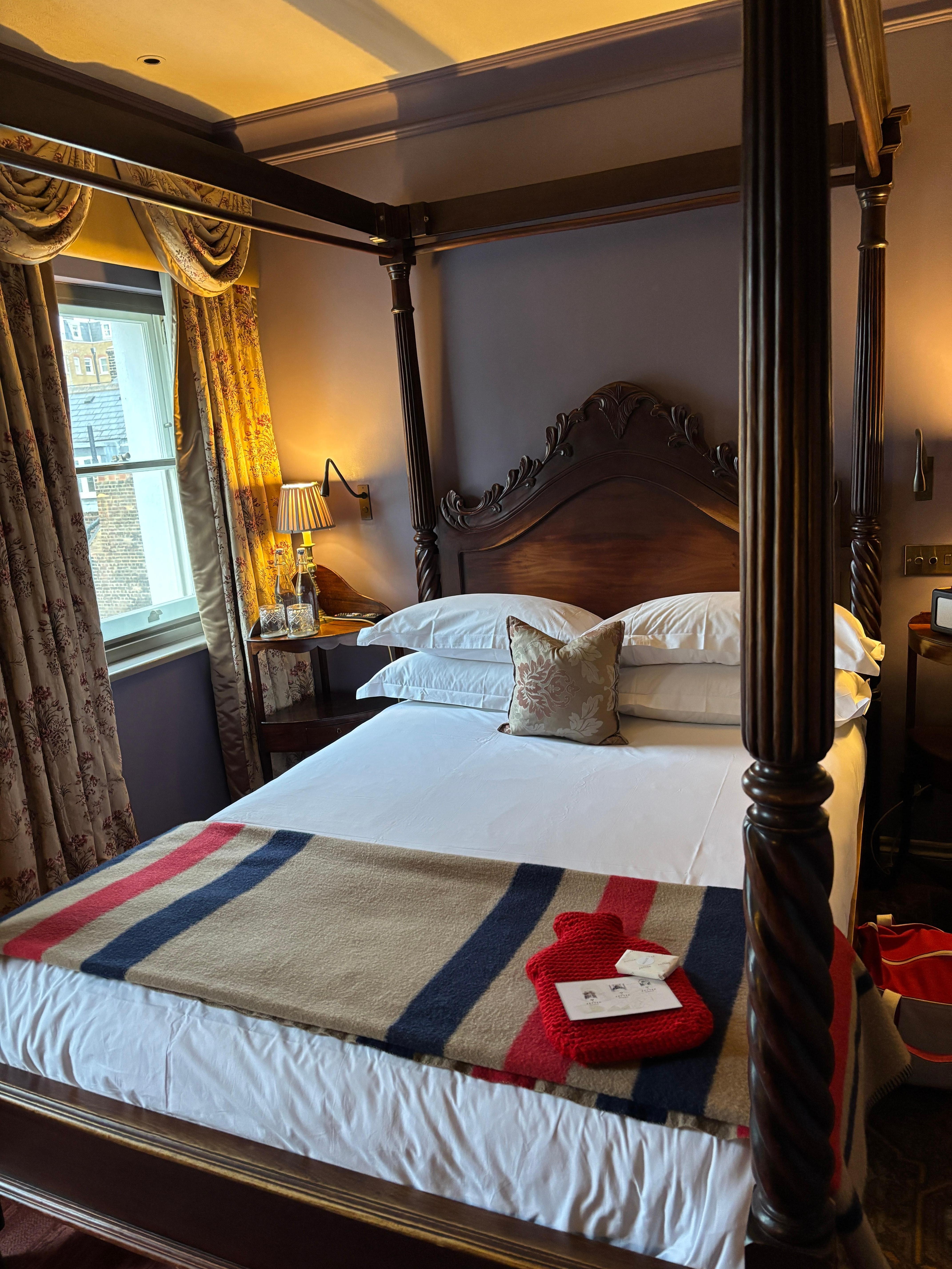 Well appointed elegant, cozy room. Note the hot water bottle! Cute
