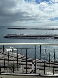 The port from our balcony with people swimming below