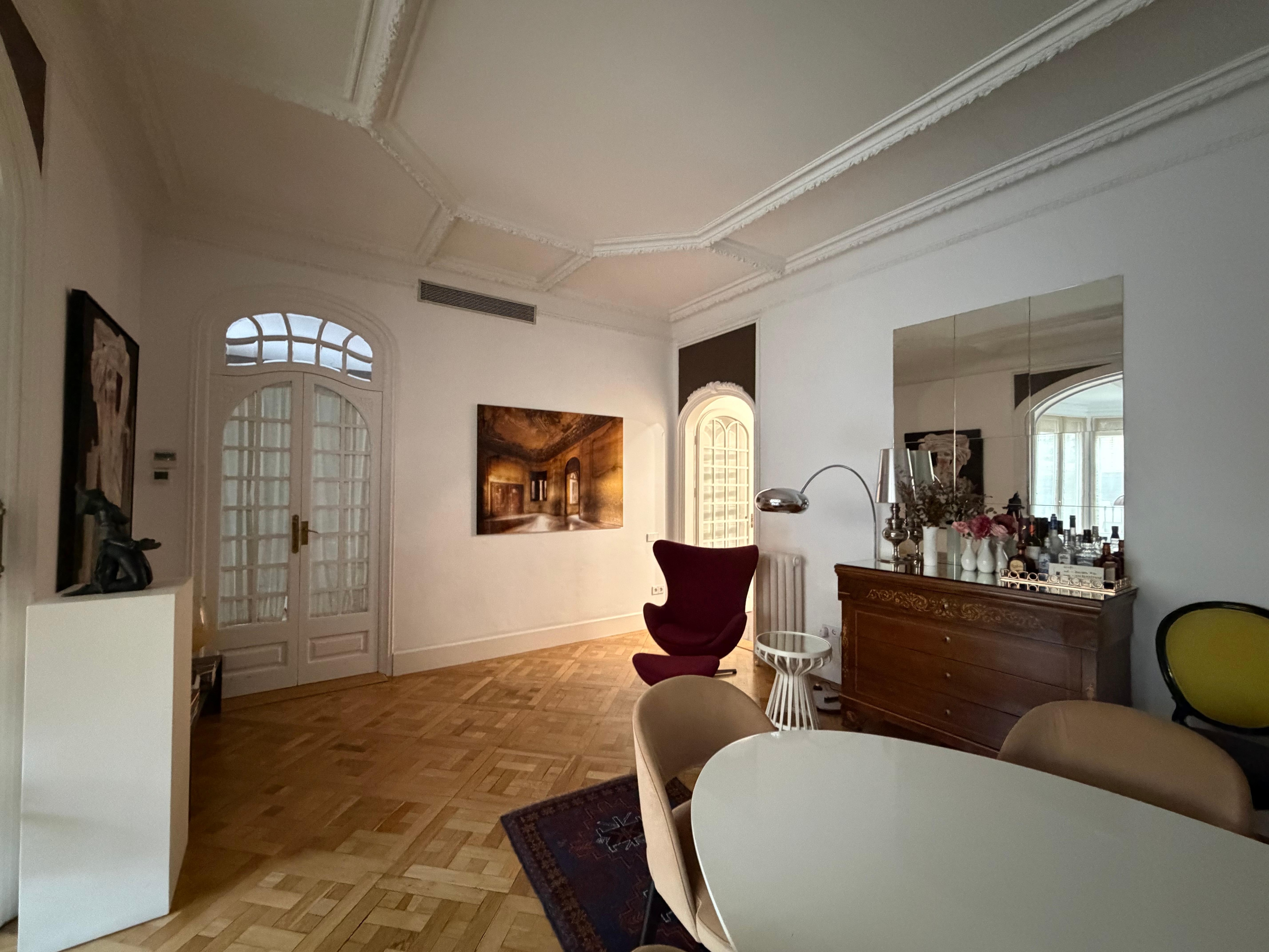 Dining room with entrance to kitchen on the right.