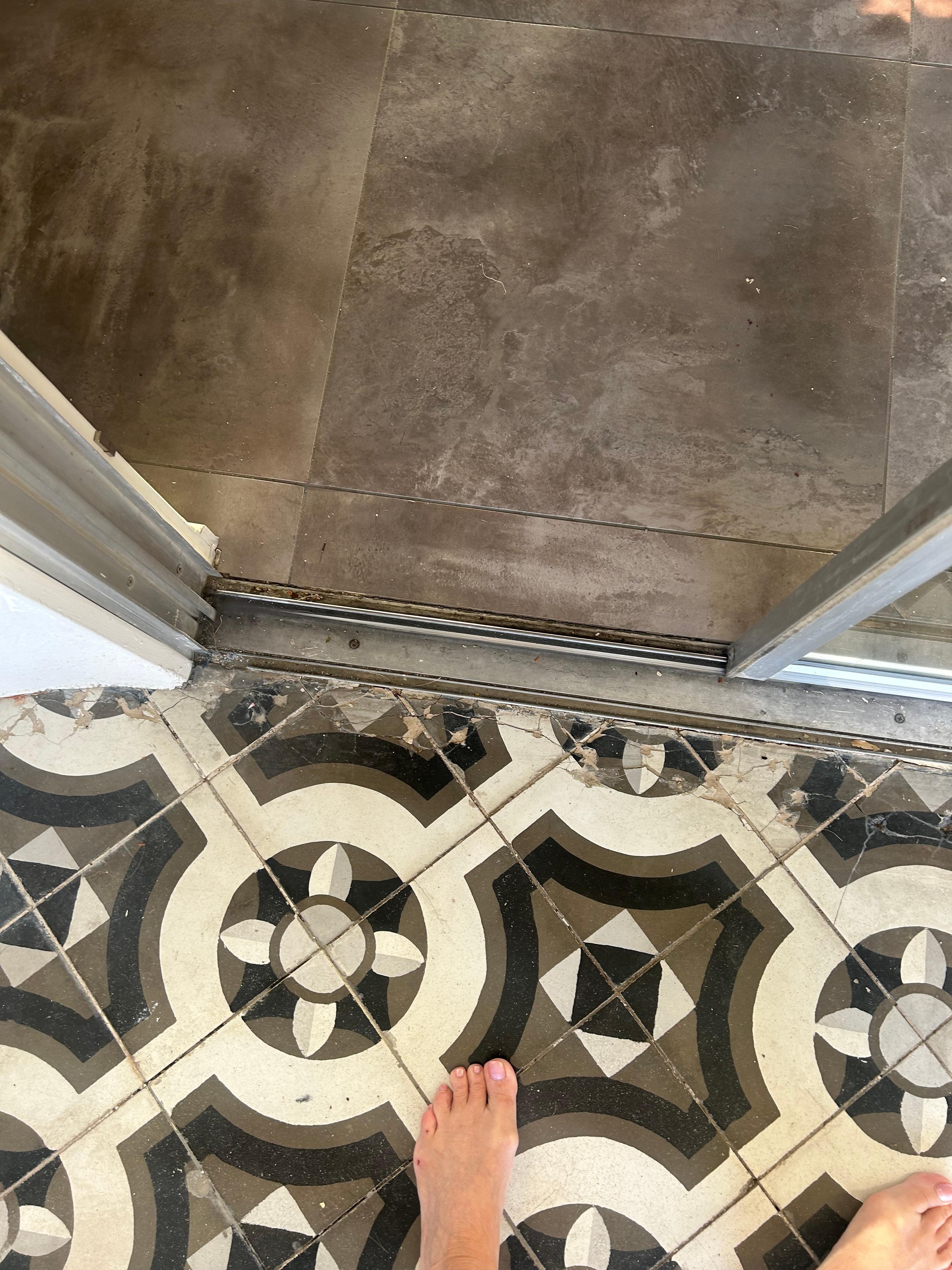 Dirty broken tile walking into the home, 