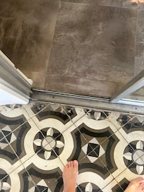 Dirty broken tile walking into the home,