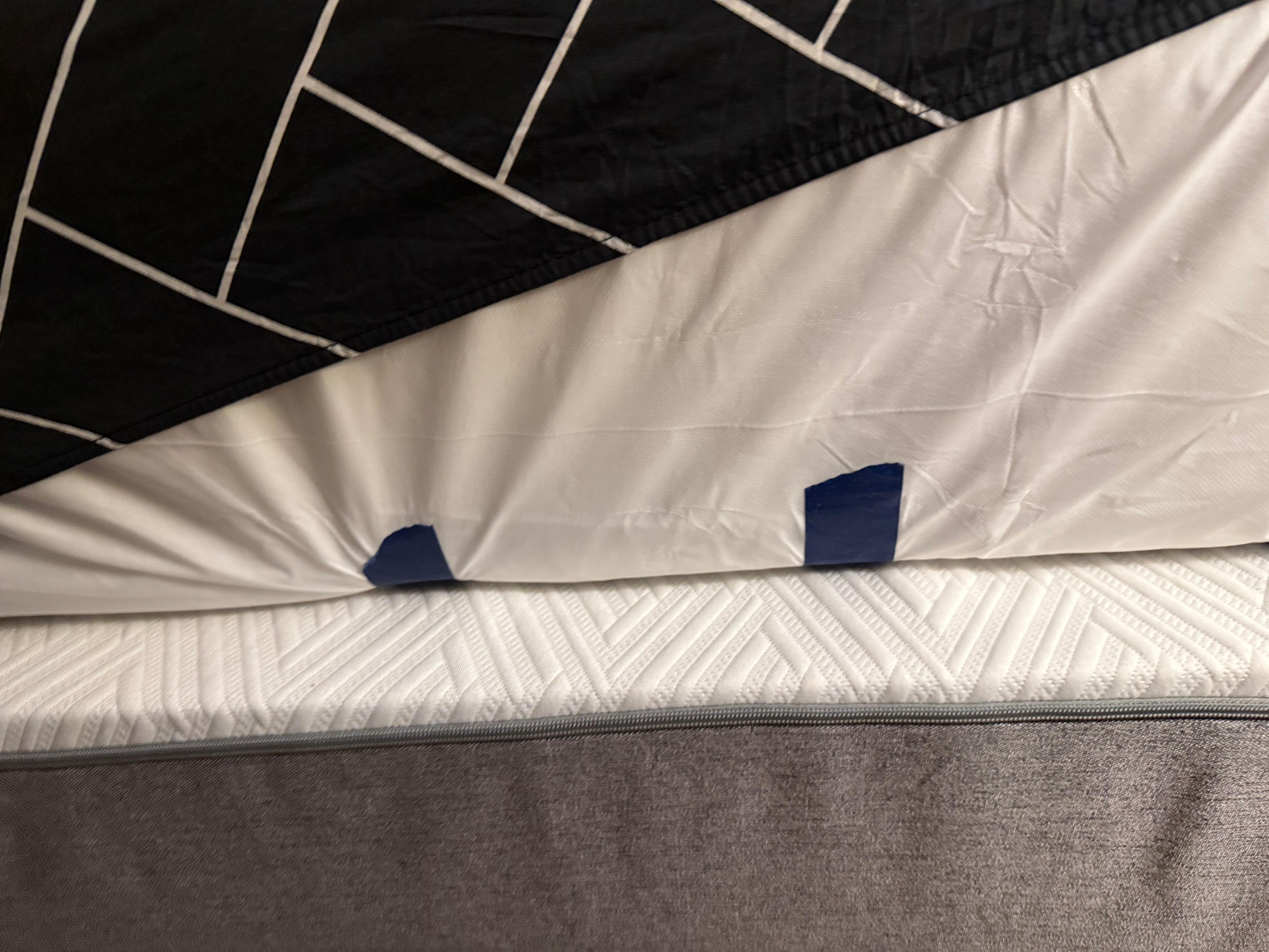 Taped mattress cover