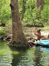 On a rope swing close by.