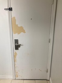 Door to hall from inside room