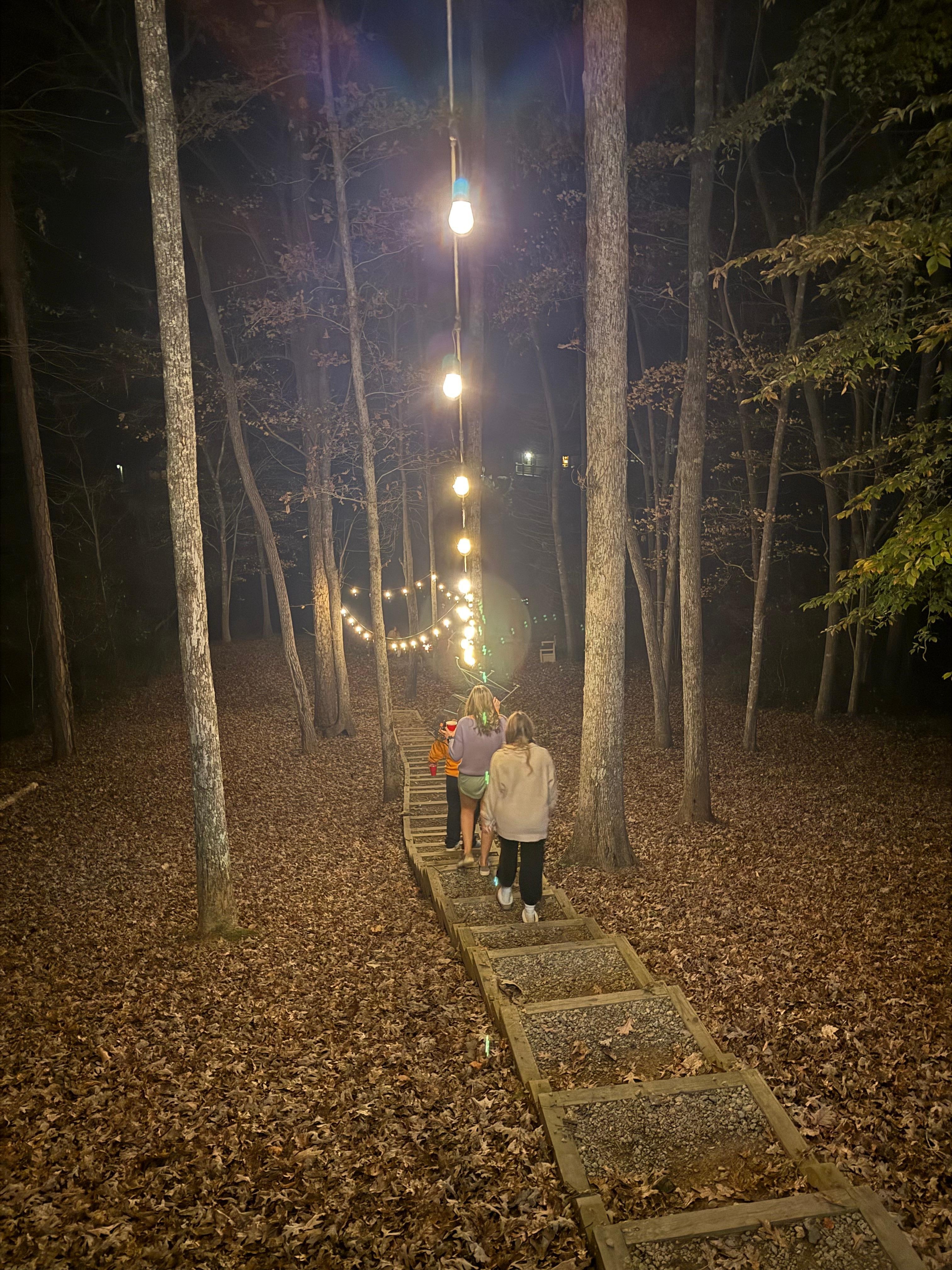 The lights add some magic on the walk to the fire pit and riverfront!