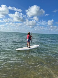 Enjoying the free paddle boarding