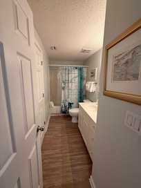 Hall bath with access to bedroom.