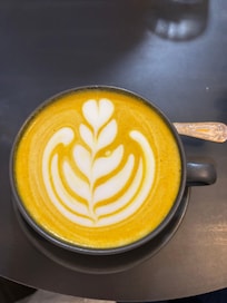 Tumeric latte from cafe next door! Highly recommend!