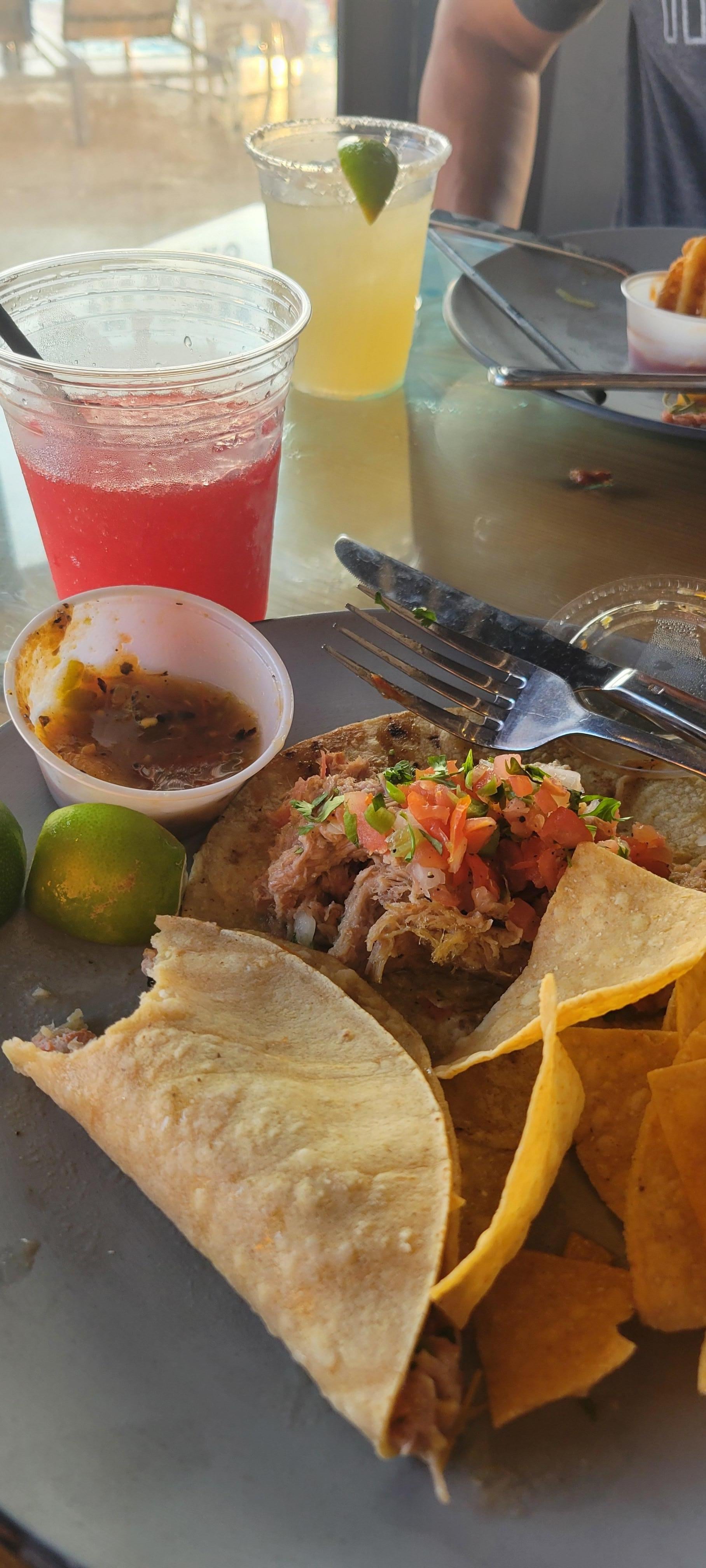 Carnitas tacos and strawberry daiquiri at the Penguins restaurant by the pool. Delish!