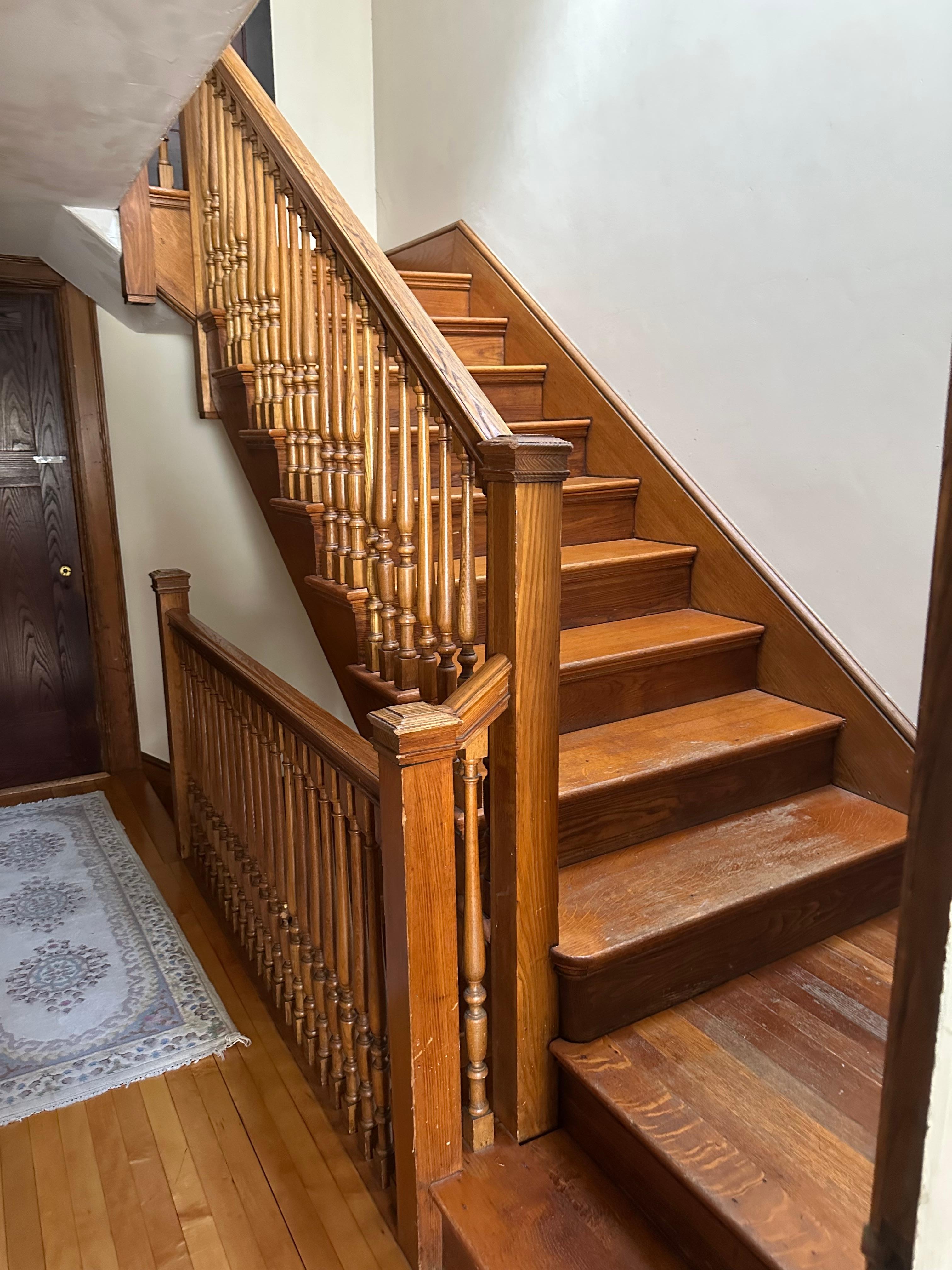 Gorgeous wooden staircase to 2nd floor 