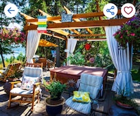 Hot tub as presented on the website taken from an angle that does not show it's proximity to the owner's window