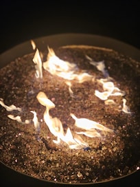 Fireplace pit right outside pool area