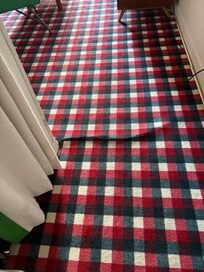 Carpet at front entrance that needed stretched (trip hazard)