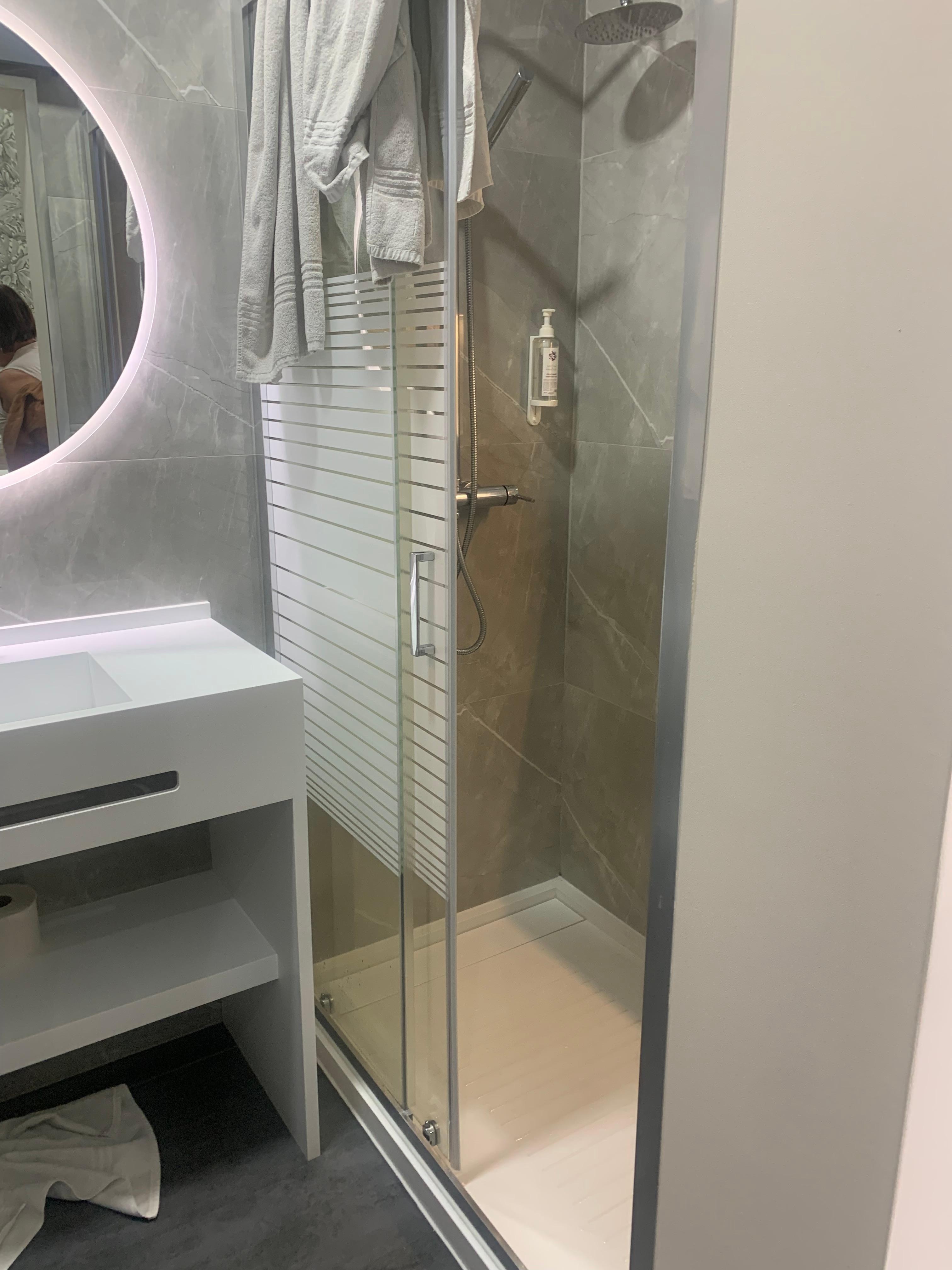 Lighted mirror, superb shower and overall great bathroom. 