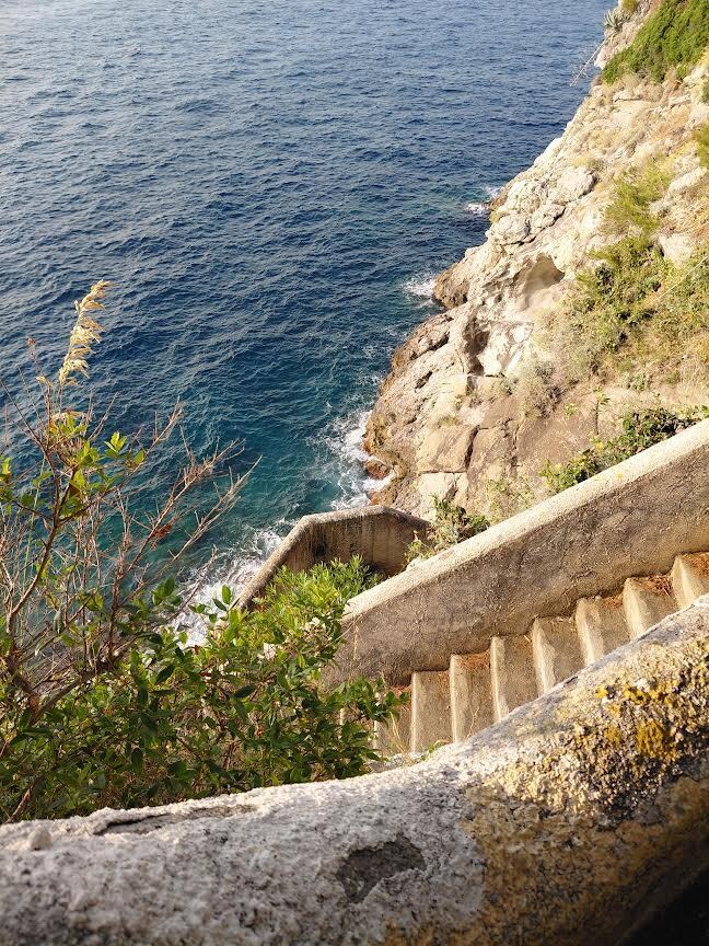 Steps to the sea! Be sure to wear sturdy shoes