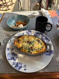 Breakfast casserole with sausage, green onions, feta, and a few other yummy things.