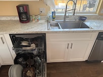 BEAUTIFUL kitchen. I don’t use a dishwasher so I used theirs to dry the dishes while we were out.