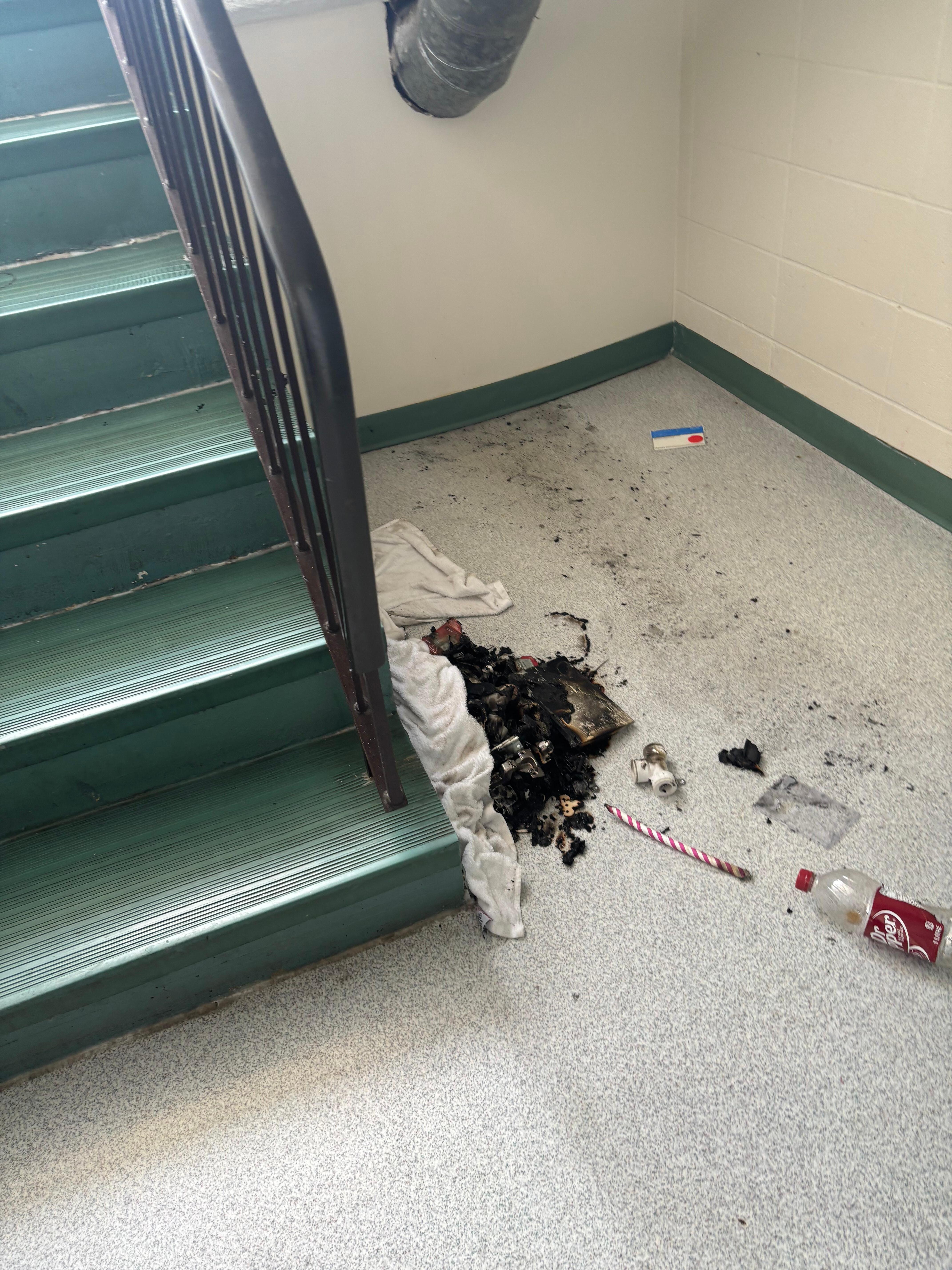 Fire from homeless person in the stairwell. 