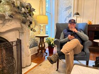 Enjoying the fire before breakfast