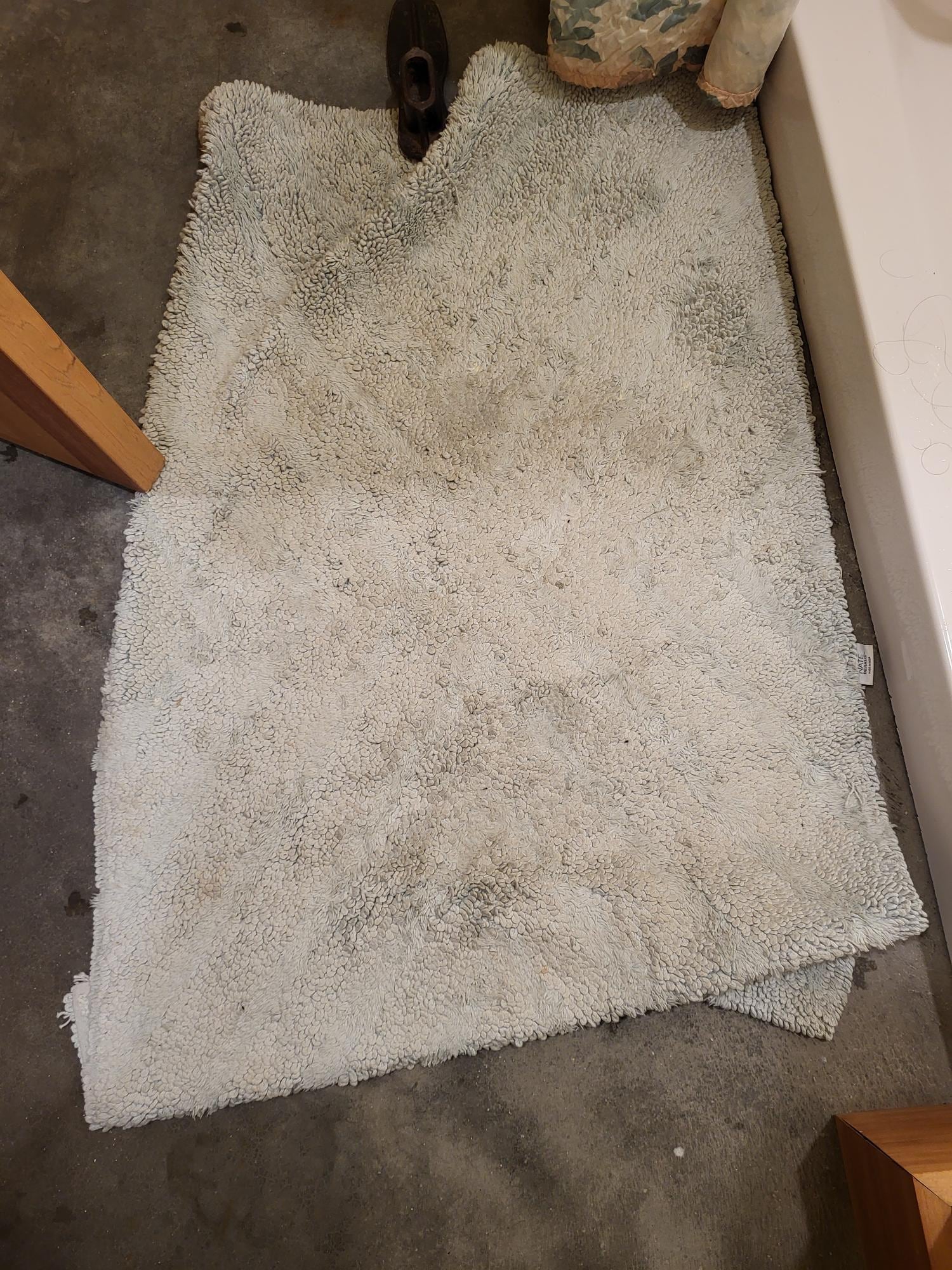 bathroom rugs were matted/ discolored 