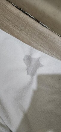 stained bath mat, dirty caulking/grout