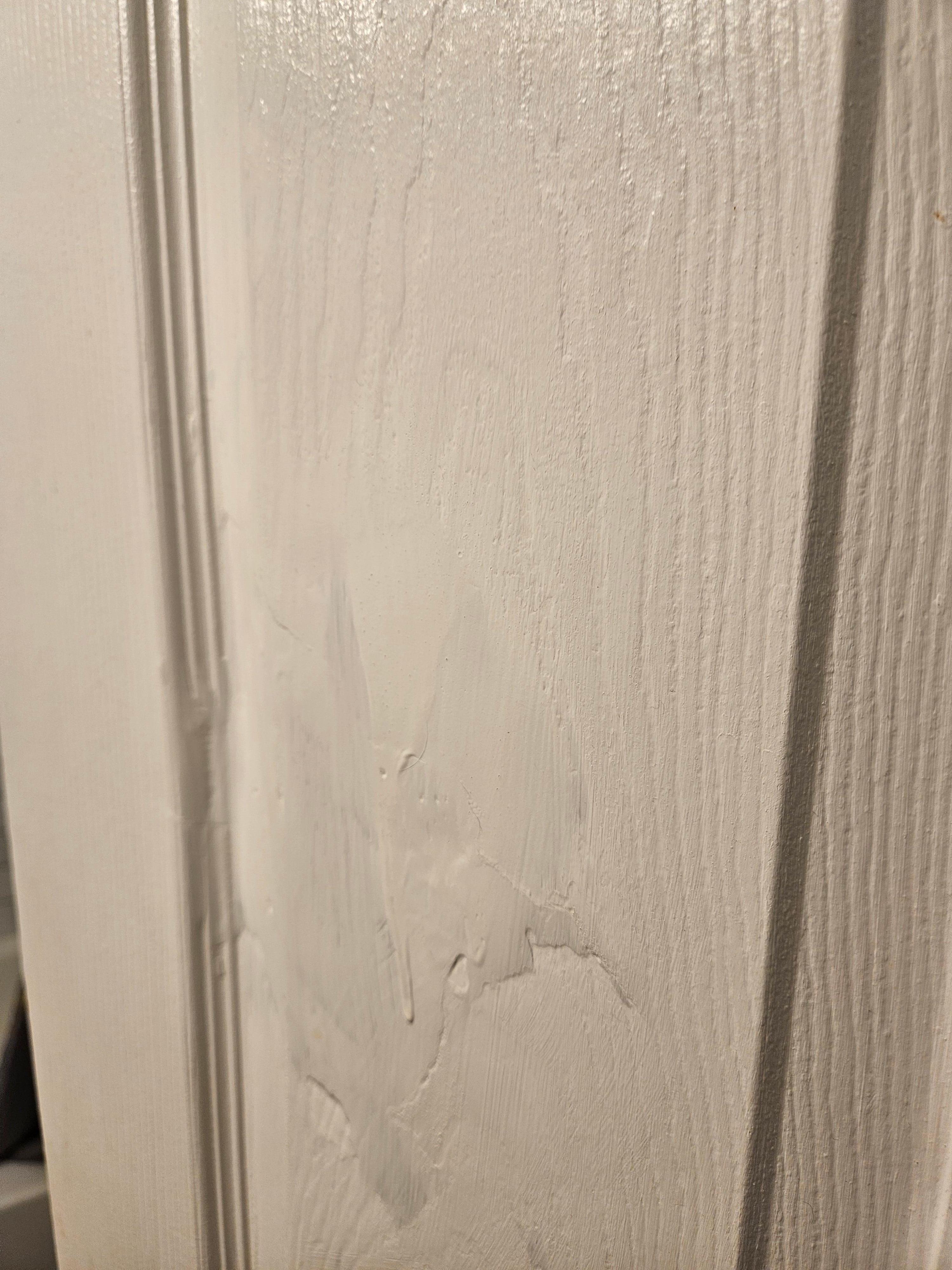 What repairs were done were completed very unprofessionally. Note the uneven surface and the dripping runners going down the wall