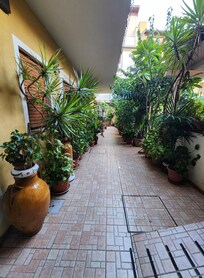 WALKWAY TO STAIRS THAT TAKE YOU TO YOUR ROOM