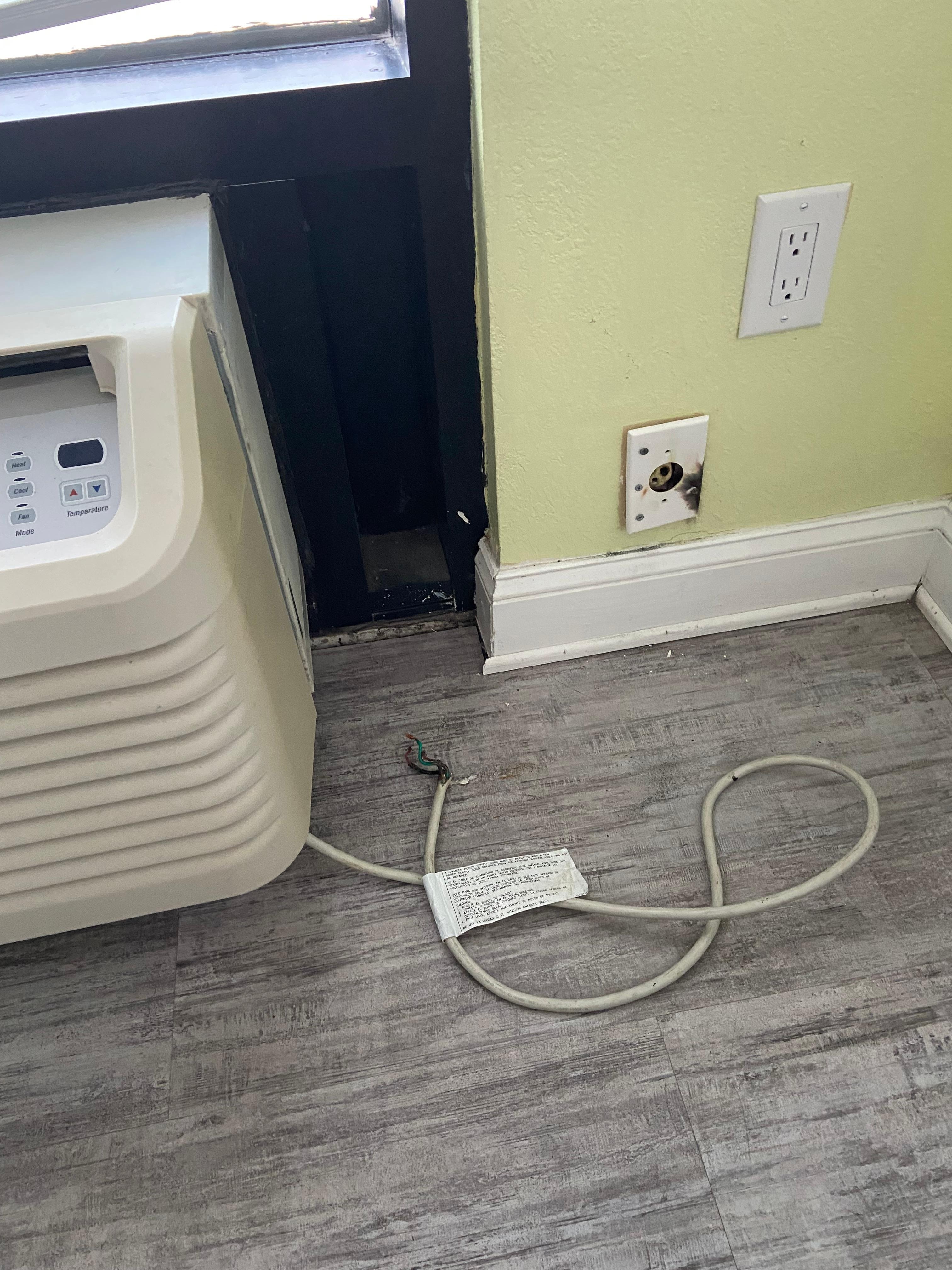 Heater plug and outlet prior to repair