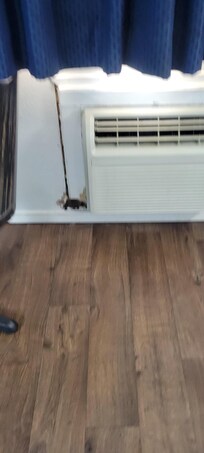 Hole in the wall by the a/c