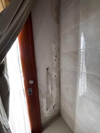 Wand in einem der Zimmer