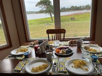 There was no dishwasher so we cheated a bit by using paper plates. We had turns being the one person sitting with her back to the view.