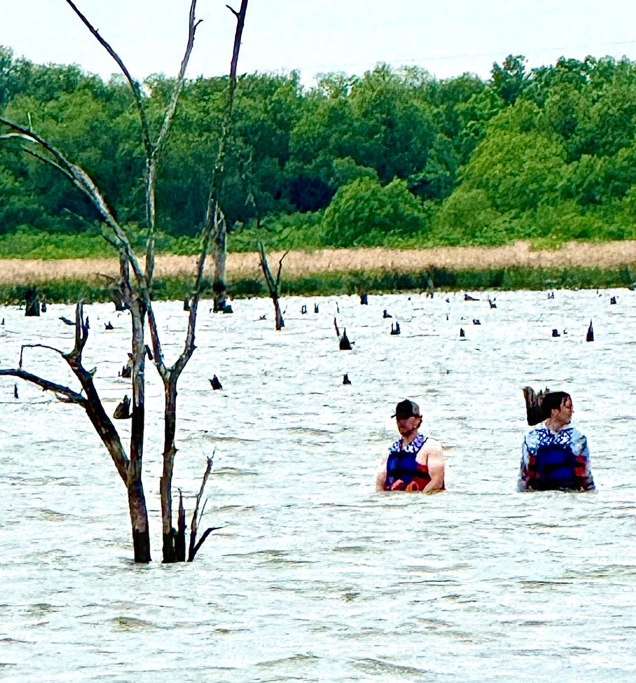 Two sons out checking trot lines and wondering about alligators just a tiny bit.  Lol