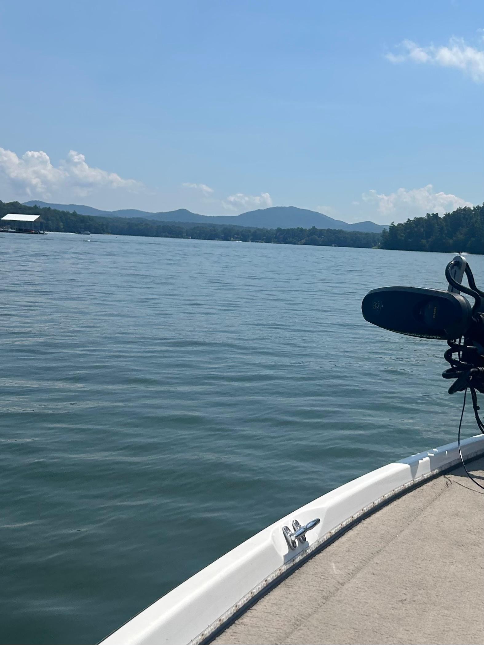 Beautiful views of the mountains on the boat ride .