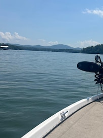 Beautiful views of the mountains on the boat ride .