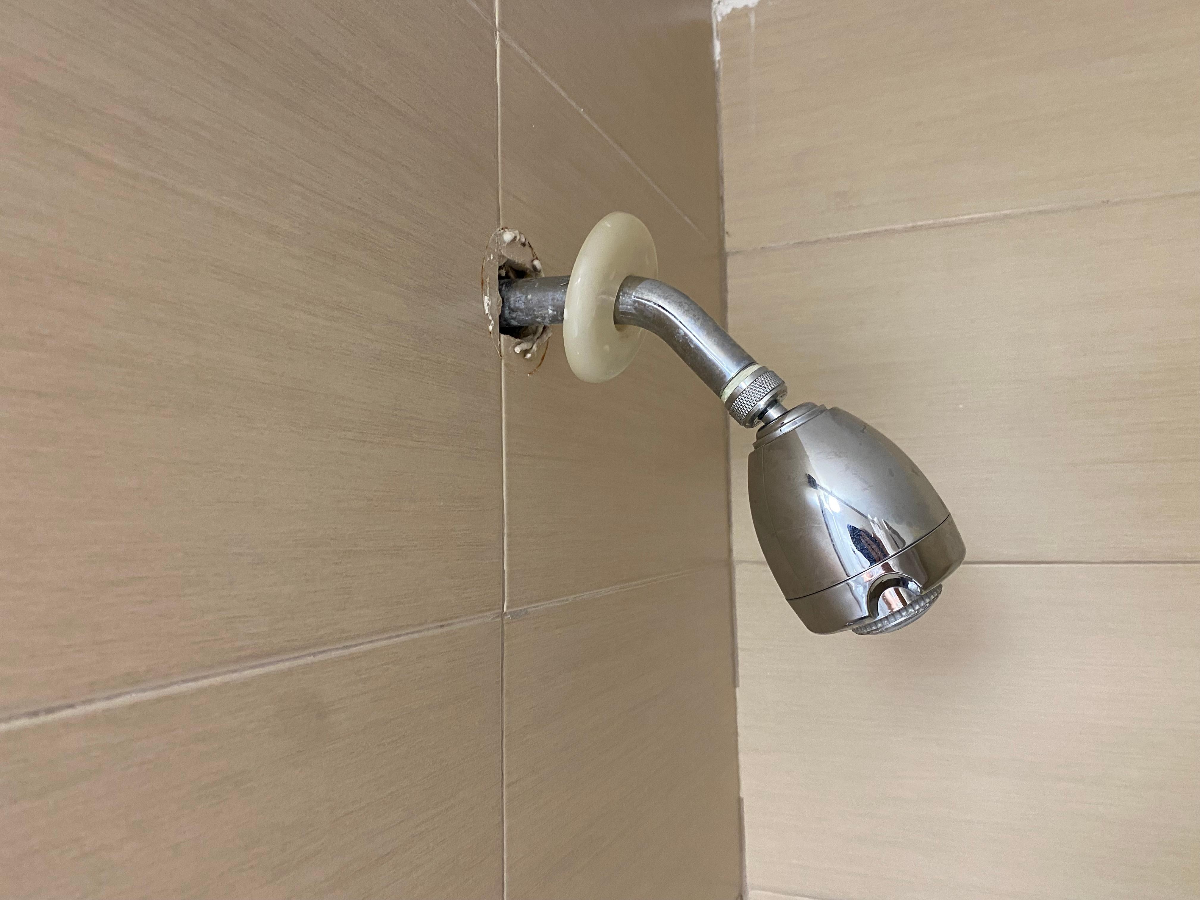 Broken shower head cover