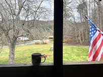 The porch made a calm spot to enjoy morning coffee while listening ro the creek.