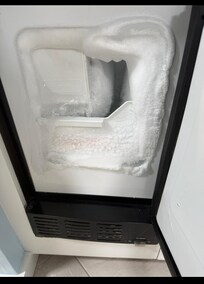 Wet bar ice maker as a solid block of ice.