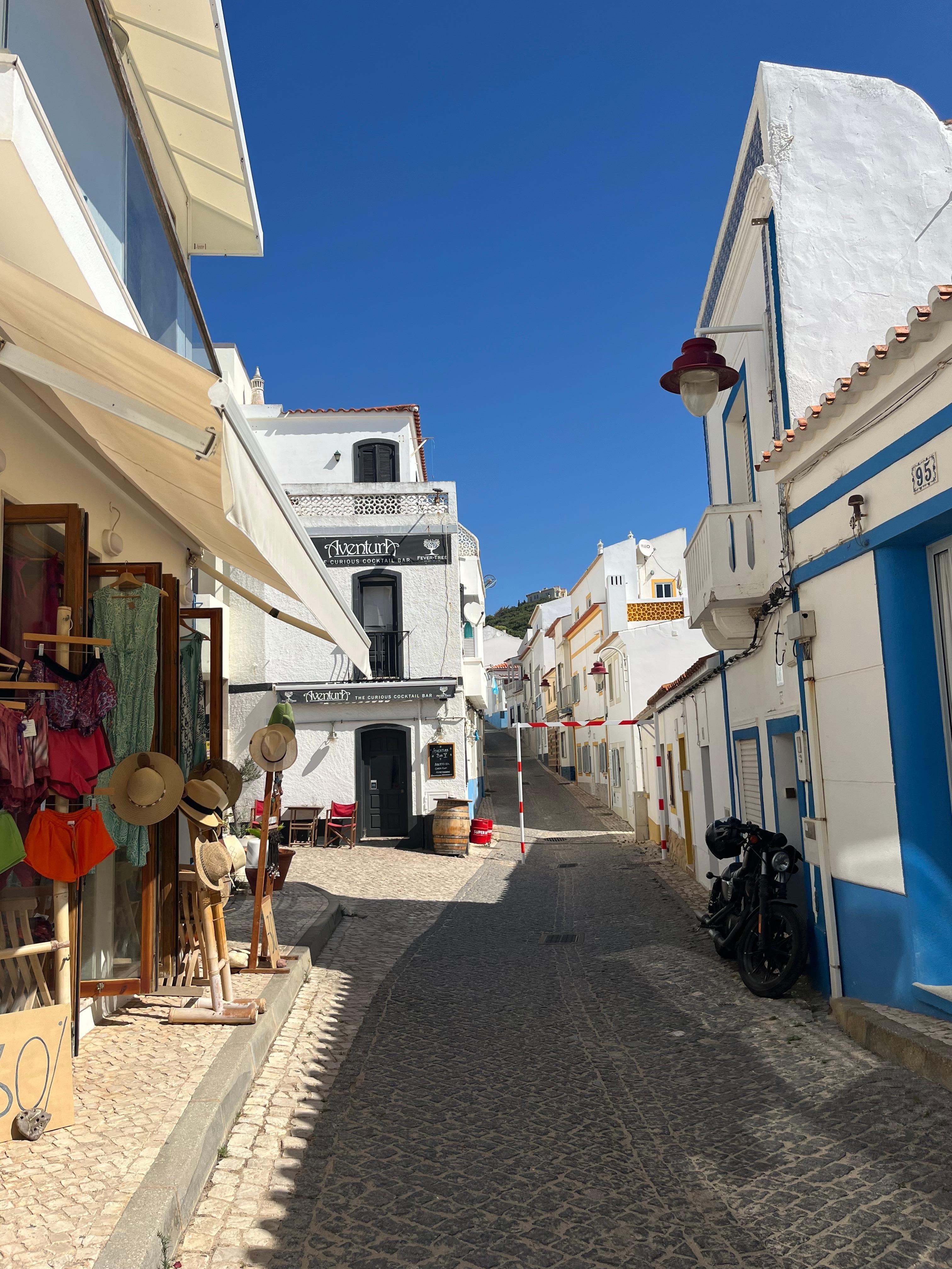 The street as you walk uphill from town and beach. 